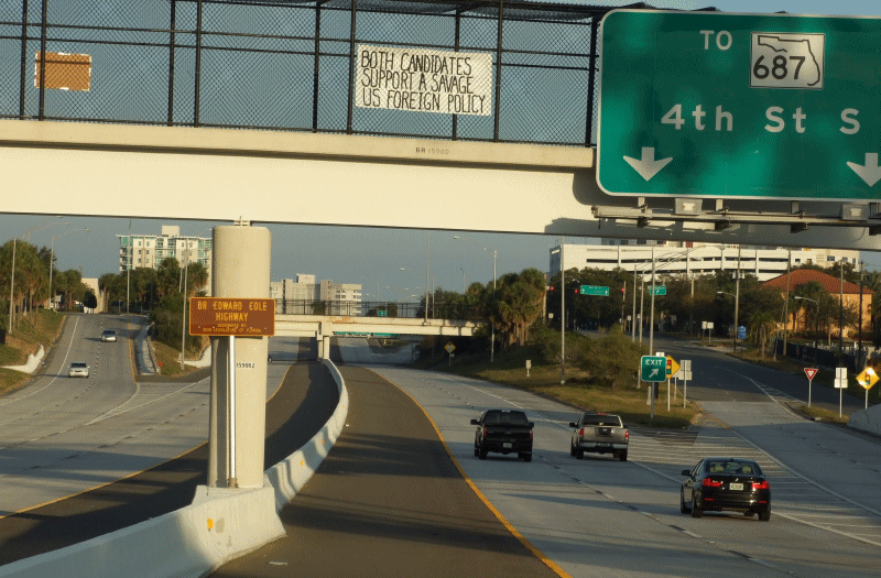 Election 2012 signs seen in St. Petersburg, FL. Both candidates support a savage u.s. foreign policy. Obama or Romney either way the war machine and Wall St. wins and civil liberties lose
