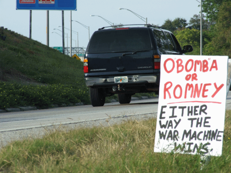 Election 2012 signs seen in St. Petersburg, FL. Both candidates support a savage u.s. foreign policy. Obama or Romney either way the war machine and Wall St. wins and civil liberties lose