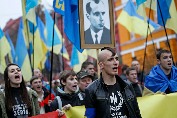 Svoboda Party marching with Stepan Bandera poster